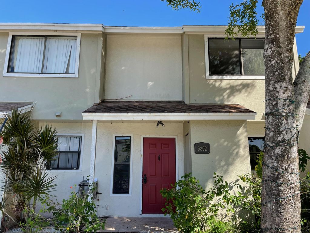 Photo of 5802 Channel Drive, Greenacres, FL 33463 (MLS # R10975958)