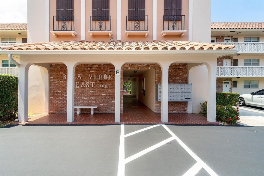 Lovely two bedroom/2 bath corner unit on the first floor with easy access and a beautiful garden view. Amazing, downtown location. 5 minutes to Mizner Park and all of the downtown restaurants, shopping and entertainment.  Walking distance to 5th Avenue shops (Publix). The beach is a ten minute bike ride.  Light, bright, open floor plan. Tile floors throughout. Plantation shutters. New light fixtures and fans, Updated kitchen with stainless steel appliances. French doors lead to the primary suite that features a huge walk in closet and an updated en-suite bathroom. Enclosed patio that can act as an extra room or a lovely lanai. BVE is a 55+ community featuring a large clubhouse with a library and exercise room, huge community pool and on-site mgmt.