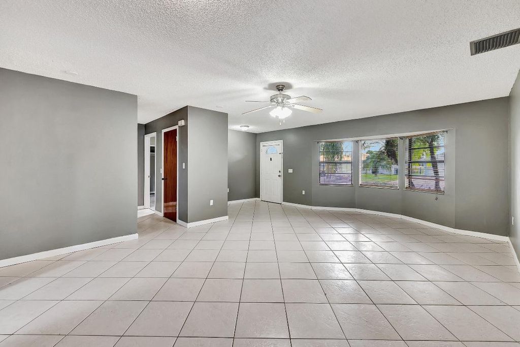 Photo of 2281 SE Shipping Road, Port Saint Lucie, FL 34952 (MLS # R10934257)