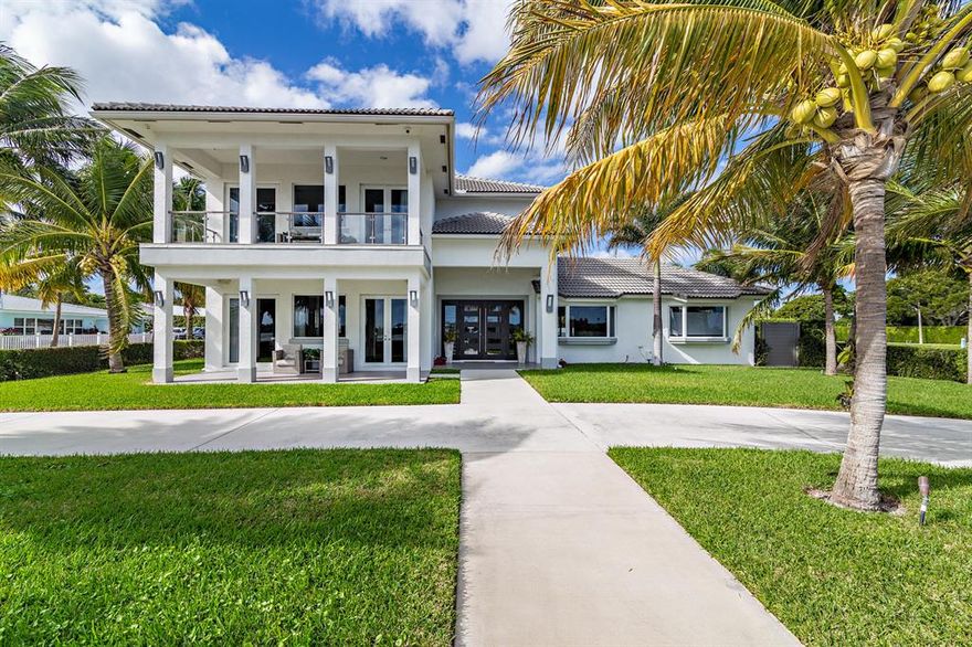 Built in 1999 yet completely renovated and redesigned this home incorporates 6,700 total square feet under roof and approximately 5,858 under air. Featuring 5 bedrooms and 4.5 bathrooms this newly appointed contemporary interior home is move-in-ready.  The master bedroom suite is situated on the easternmost part of the second floor and has wide Intracoastal views while incorporating a large walk-in designer closet, vaulted ceilings and state of the art bathroom.  As a bonus, this home has an attached mother-in-law/ nanny suite on the 2nd floor which is perfect for guests, older children or live-in assistance. Included with this sale are the dock and the 2 boat lifts across Flagler Drive. Close to area beaches, Worth Avenue shopping, fabulous dining and the magical Flagler Drive bike path.