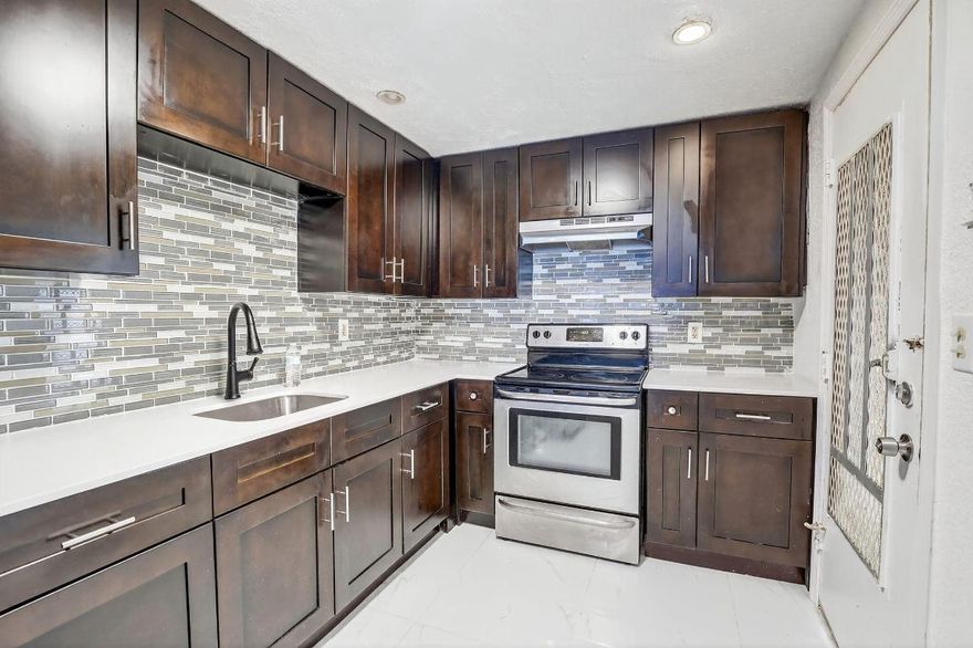 Welcome home to this beautifully updated first-floor 2-bedroom, 1-bath condo!  Step inside to find a bright and inviting space featuring a newly renovated kitchen with modern finishes and new tile floors throughout.  Freshly painted from top to bottom, this home is truly move-in ready. Enjoy a cozy dining area perfect for everyday meals or intimate gatherings, seamlessly flowing into a large family room ideal for relaxing or entertaining guests. The spacious primary bedroom offers a sizable walk-in closet, while two additional hallway closets provide plenty of extra storage.  Walk right out and unwind on your private patio overlooking the sparkling pool and clubhouse.  Meet your neighbors at the common laundry in the complex. Enjoy piece of mind with an AC unit replaced in 2020. Includes one assigned parking space right in front of the unit, with additional guest parking available.  Located in an all ages community, the complex is privately nestled in a peaceful area. Conveniently located very close to both the Florida turnpike and I95. Close to shopping, schools, and entertainment.