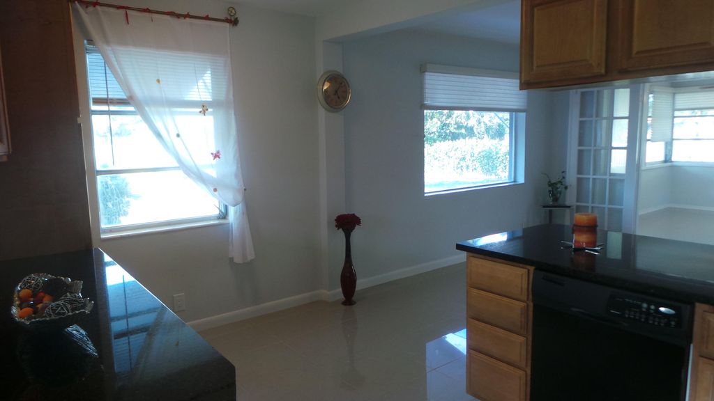 Photo of 370 ORANGE Way, West Palm Beach, FL 33405 (MLS # B26056849)