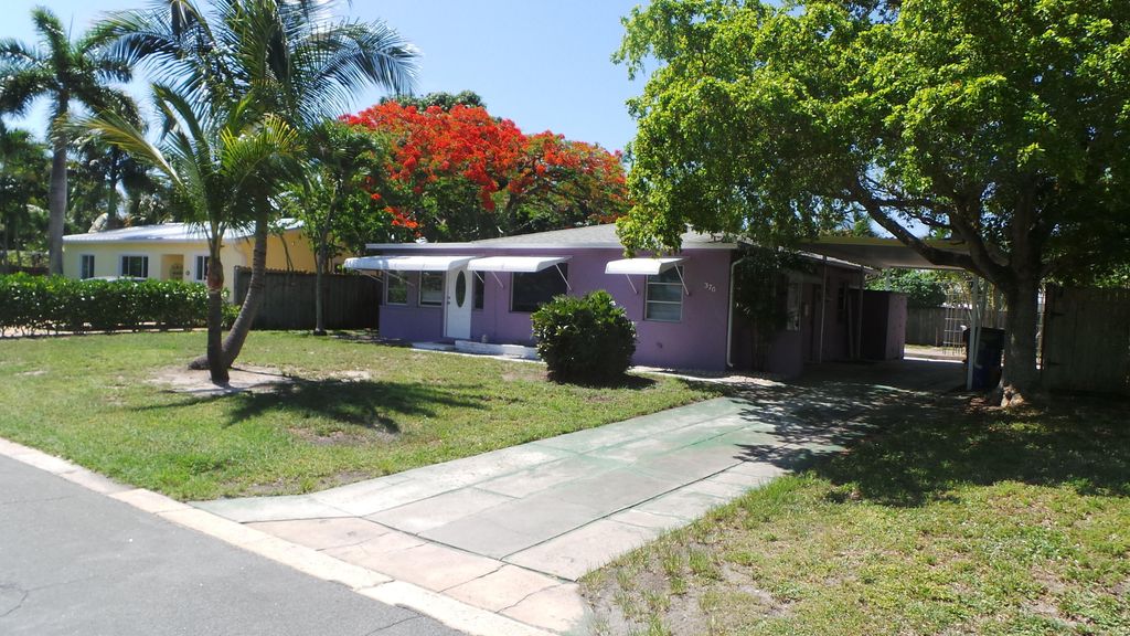 Photo of 370 ORANGE Way, West Palm Beach, FL 33405 (MLS # B26056849)