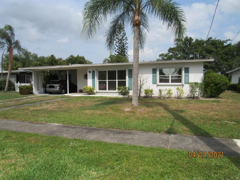 Photo of 3065 SE Morningside Boulevard, Port Saint Lucie, FL 34952 (MLS # R10710896)