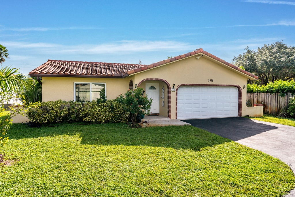 Photo of 2315 NW 98th Lane, Coral Springs, FL 33065 (MLS # B26088950)
