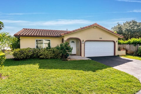 Photo of 2315 NW 98th Lane, Coral Springs, FL 33065 (MLS # B26088950)