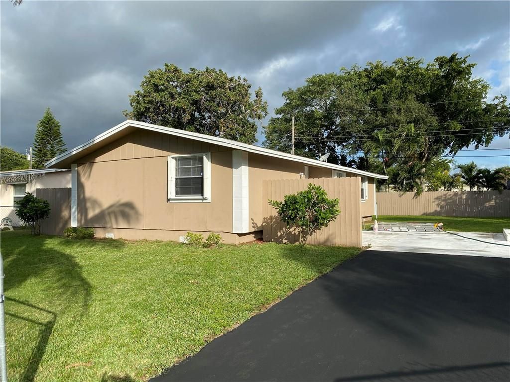 Photo of 3817 Mackinac Rd, Lake Worth Beach, FL 33462 (MLS # F10282099)