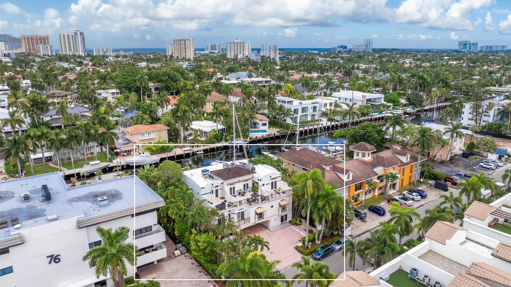 $6700/mo with 45+/- boat dock included in the rent. $5500/mo without boat dock. Available immediately. Furnished or unfurnished. This beautifully appointed end unit, 2-level penthouse, 3-bedroom, 3-bath second-floor entry unit offers soaring ceilings, expansive living spaces, and enormous balconies inviting in the sun and sea-breeze. This rare property provides a sparkling pool, direct ocean access canal, 2-car parking, and a +/- 45-foot deeded boat slip — ideal for boaters seeking quick, no fixed bridge access to the Intracoastal & Atlantic. 
The third bedroom is a flexible space, currently configured as a home office, and does not include a built-in closet, making it ideal for guests, remote work, or a creative studio.