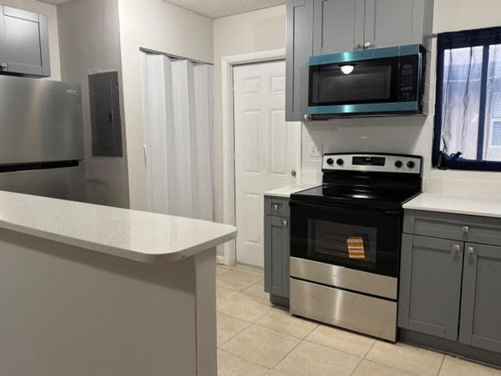 Photo of 322 SW 2nd Street #3, Pompano Beach, FL 33060 (MLS # B26043400)