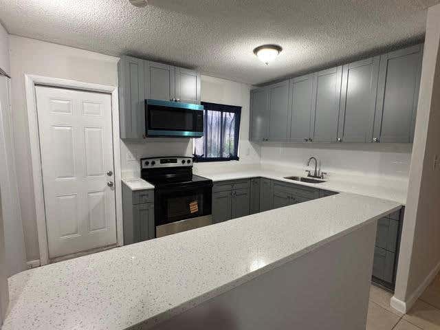 Photo of 322 SW 2nd Street #3, Pompano Beach, FL 33060 (MLS # B26043400)