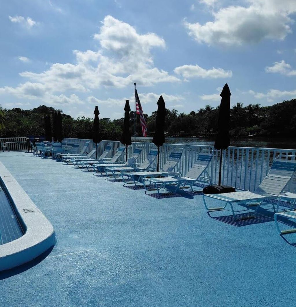 Photo of 4001 S Ocean Boulevard #122, South Palm Beach, FL 33480 (MLS # B26013709)