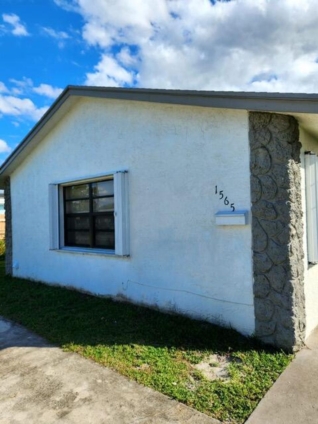 Photo of 1565 W 36th Street, Riviera Beach, FL 33404 (MLS # B26002008)