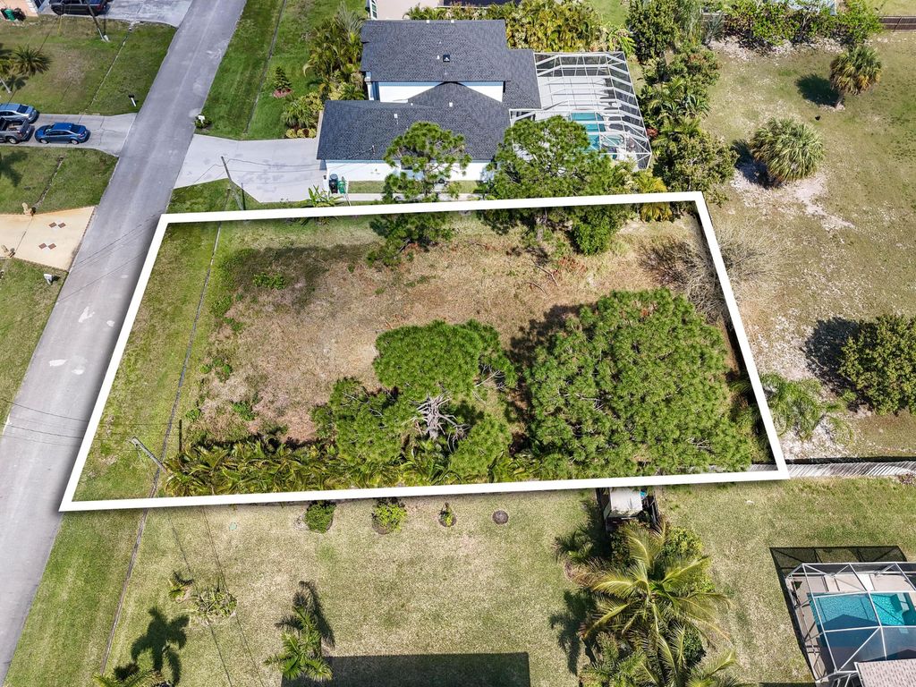 Photo of 5849 NW Mesa Circle, Port Saint Lucie, FL 34986 (MLS # R11145291)