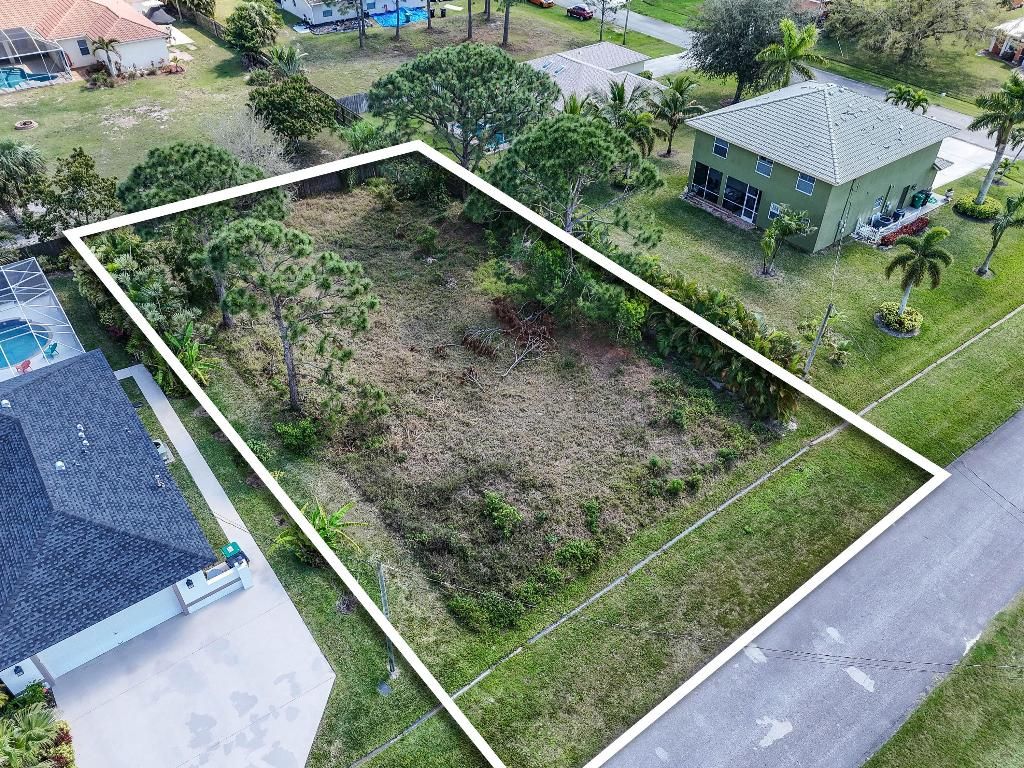 Photo of 5849 NW Mesa Circle, Port Saint Lucie, FL 34986 (MLS # R11145291)