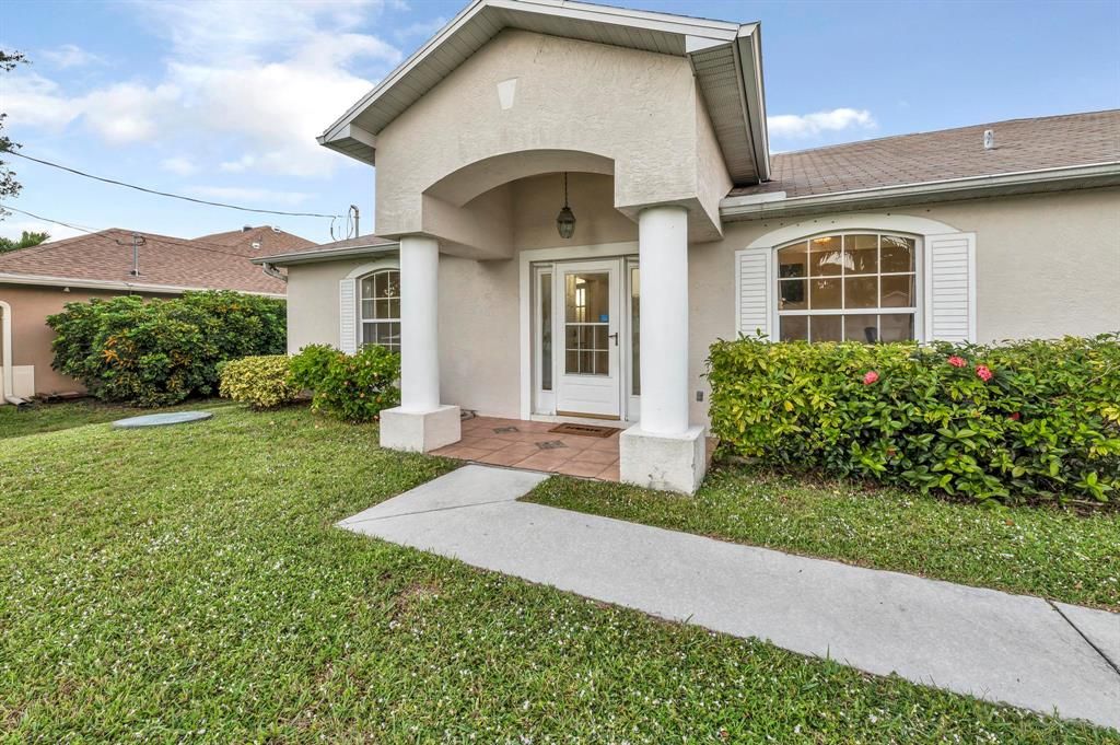 Photo of 2265 SE Marsh Avenue, Port Saint Lucie, FL 34952 (MLS # R10758232)