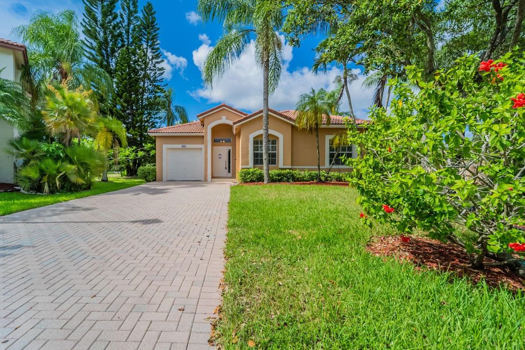 Photo of 6051 NW 41st Drive, Coral Springs, FL 33067 (MLS # F10511070)