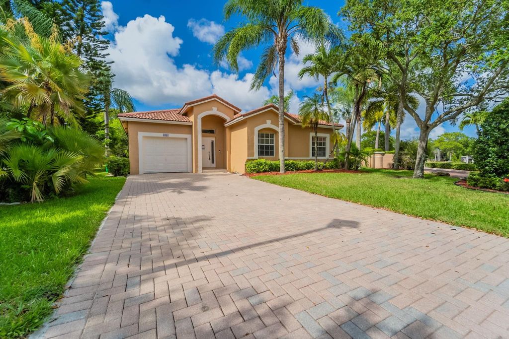 Photo of 6051 NW 41st Drive, Coral Springs, FL 33067 (MLS # F10511070)