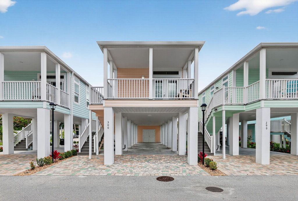 Photo of 300 NE Coastal Drive, Jensen Beach, FL 34957 (MLS # R11124018)