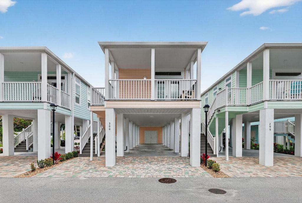 Photo of 300 NE Coastal Drive, Jensen Beach, FL 34957 (MLS # R11124018)