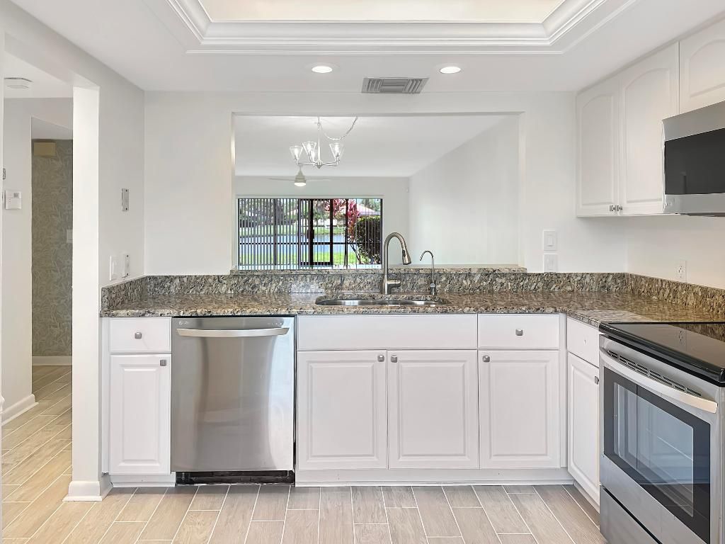 Photo of 3351 Twin Lakes Terrace #102, Fort Pierce, FL 34951 (MLS # R11126109)