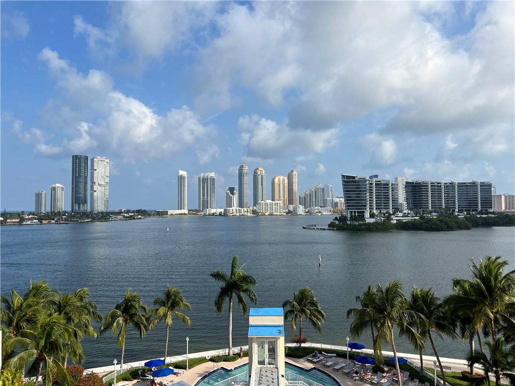 Rarely available unfurnished three bedroom, 3 1/2 bath. Washer dryer in the unit and breathtaking water views throughout the unit in the Aventura Hidden Bay community. The community offers world-class amenities such as resort style pools, fitness center, massage and spa area, game room, library, community and event room. Also has tennis courts, pickle ball courts and fishing from the bay. Free shuttles and a serene walking path. Boat slips are available for rent. Rent includes cable, Internet, hot water, garage parking space and all amenities. This unit is within minutes of the Aventura Mall, shopping, dining and the Aventura arts and craft cultural center. Just re-painted and refreshed.