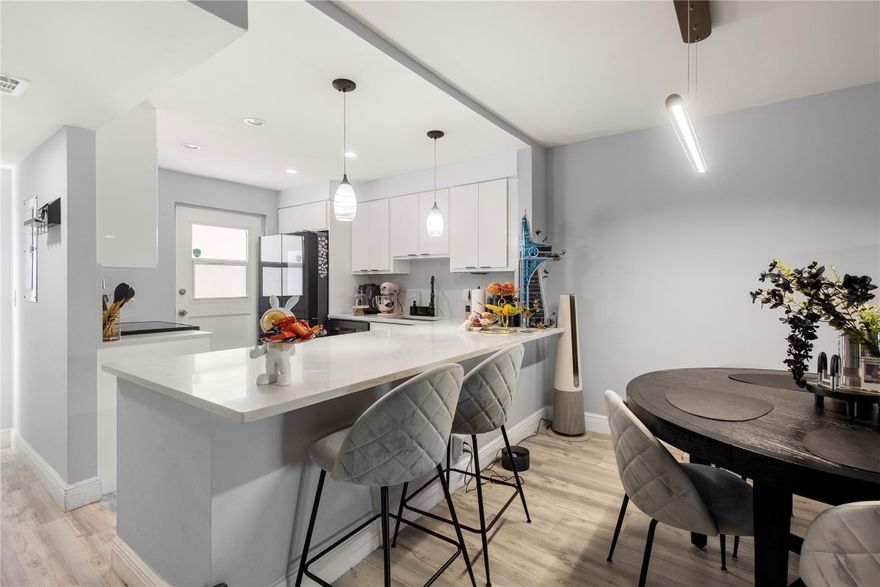 PRICED TO SELL. Completely renovated 3-bedroom, 2-bathroom, ideally located just minutes from the beach. This elegant condo features an open floor plan with modern finishes, a gourmet kitchen with Brande new high-end appliances and High-gloss finish kitchen cabinets. Brand new bathroom vanities. Vinyl flooring all throughout. High impact windows and sliding door . Don't miss this opportunity.water, internet and cable included. All assessment paid in full.