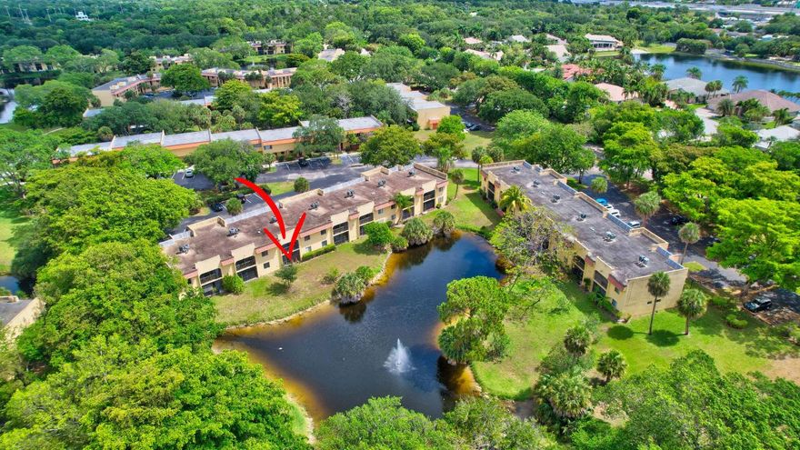 Fabulous lake and fountain views from your screened patio in this first-floor condo in Boca Terrace, an all-ages community zoned for Addison Mizner and Boca Raton High Schools. Ideal location just west of I-95 and across the street from Sugar Sand Park. Current owners are snowbirds so the condo has been gently used since 2000. The owners' suite offers two spacious closets, an en suite bath, and a lake view from the window. Full size washer and dryer are conveniently located in the storage closet on the patio. Both baths have new vanities and toilets.  Newer carpet in both bedrooms and living room. Low HOA fee includes 2 pools (one is heated), clubhouse with game room and on-site manager, basketball and tennis courts and picnic area with barbeque grills. Lots of green space in which to enjoy nature. The association does not allow pets, trucks of any kind, or motorcycles including scooters. One assigned parking space with plenty of guest parking. Sugar Sand Park is a 132-acre park with nature trails and is home to the Children's Science Explorium, the Willow Theatre, and the Field House which features an indoor gymnasium. The condo is just 15 minutes to the beach! Check out the 3D Video Tour and schedule a private showing today!