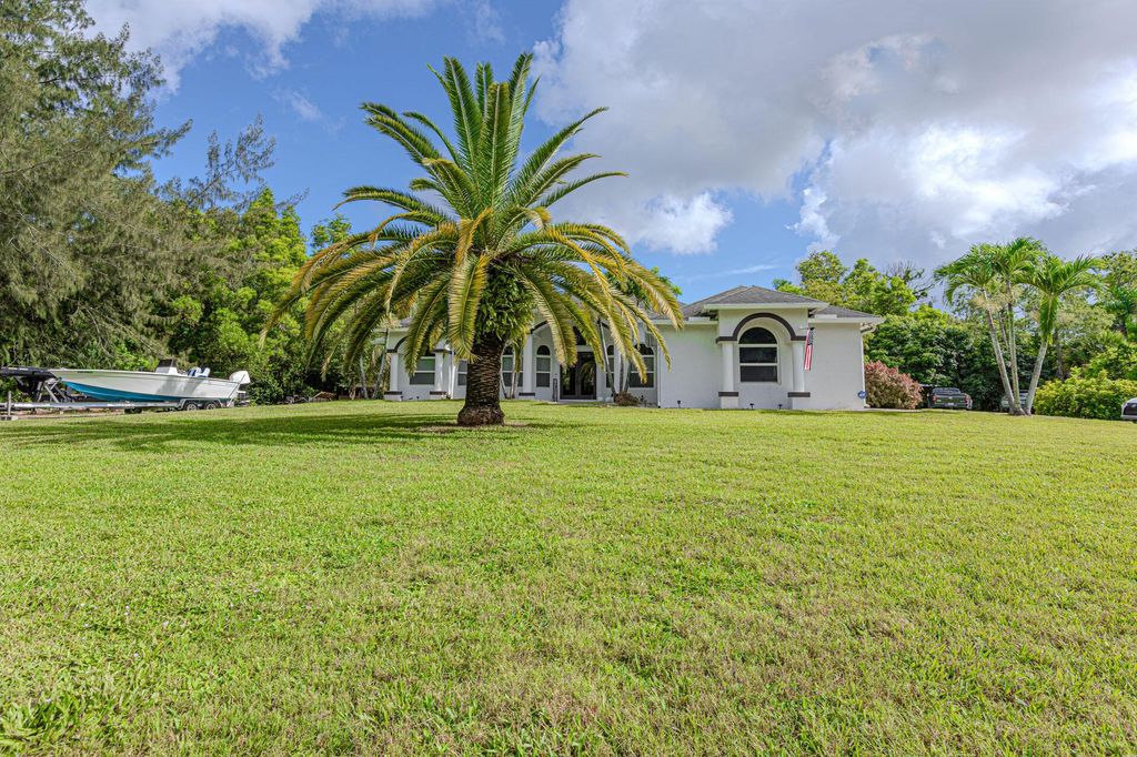 Photo of 13051 41st Lane N, The Acreage, FL 33411 (MLS # R11103459)