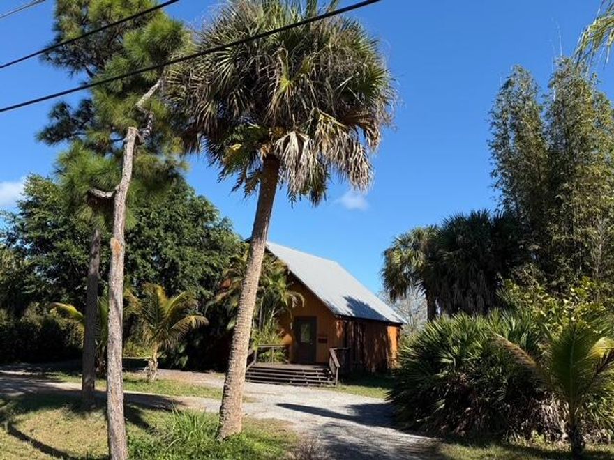 SPECTACULAR VIEW OF THE SAVANNAH PRESERVE SETS THIS HOME APART, OFFERING A RARE OPPORTUNITY TO ENJOY INCREDITABLE WILDLIFE AND PICTURESQUE SCENERY FROM ONE OF THE QUIETEST STREETS IN THE NEIGHBORHOOD,WITH BIKE TRAILS, THIS HOME DELIVERS BOTH SERENTY AND OUTDOOR ADVENTURE WITH RUSTIC 1400 SQ FT HOME, THE OPEN LAYOUT WELCOMES YOU THE MOMENT YOU ENTER. THE KITCHEN  OPENS TO THE LIVING AND DINING AREA MAKING IT IDEAL FOR ENTERTAINING. HOME INCLUDES A TASTEFUL BLEND OF CEDAR PLANK AND TILE ADDING WARMTH AND DURABILTY THROUGHT OUT THE HOME. FRENCH DOORS LEAD TO OUTDOOR DECK PERFECT FOR RELAXING AND ENJOYING EXPLANSIVE VIEWS.  FLOATING STAIRS TO PRIMARY BEDROOM UPSTAIRS FEATURES ITS OWN PRIVATE DECK CREATING A PEACEFUL RETREAT. INDIAN RIVER LAGOON, BEACH, BOATING FEW MILES AWAY.