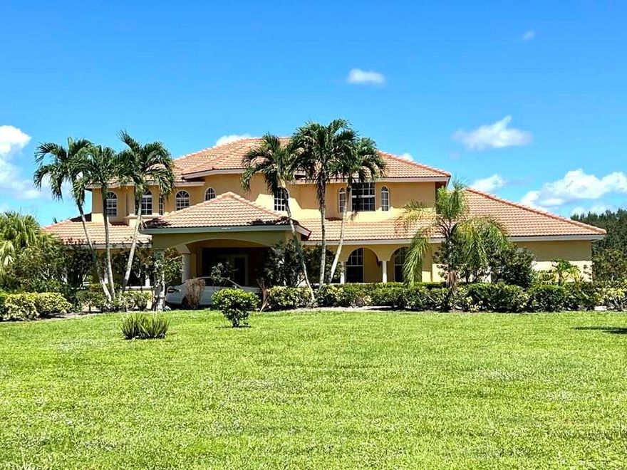 Fabulous home on 2.45acres right in the Equestrian area, golf cart distance to the horse show and schools.  Huge back yard, tons of space at the end of the cul de sac on the bridle trail .  This home can be rented short term or annually.  This is an amazing price for so much square footage and bedrooms!!