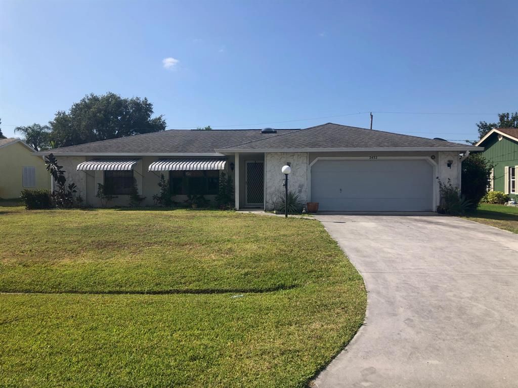 Photo of 2432 SE Caligula Avenue, Port Saint Lucie, FL 34952 (MLS # R10718082)