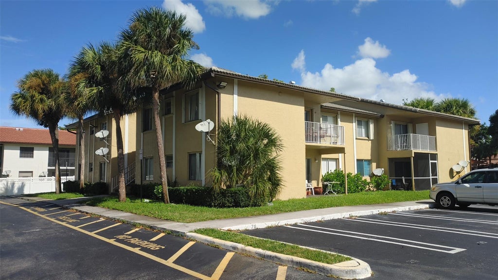 Photo of 11585 NW 44TH Street #11585, Coral Springs, FL 33065 (MLS # B26083106)