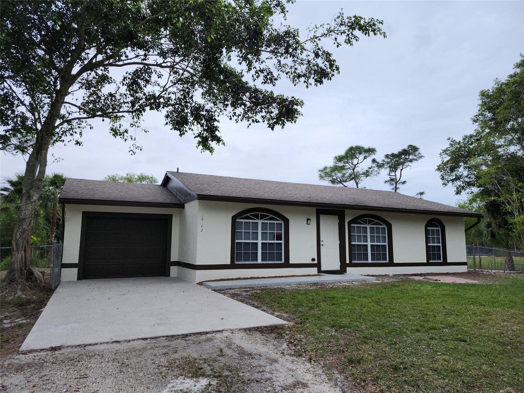 Photo of 18142 Murcott Boulevard, Loxahatchee, FL 33470 (MLS # F10475994)