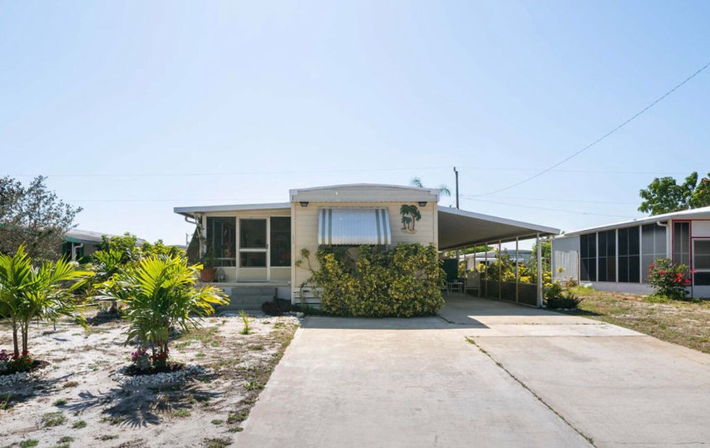 Photo of 7992 SE Skylark Avenue, Hobe Sound, FL 33455 (MLS # R10786754)