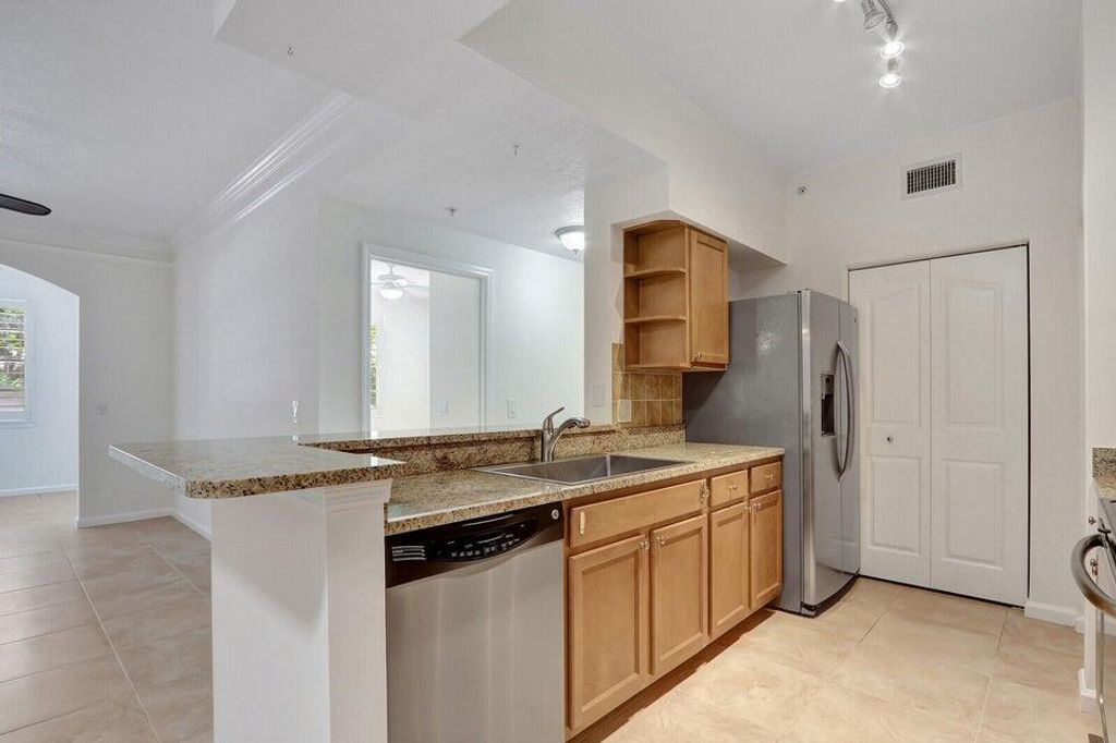 Photo of 7101 MYRTLEWOOD Circle W, Palm Beach Gardens, FL 33418 (MLS # B26056758)