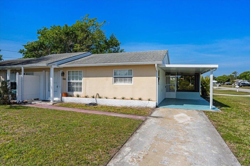 Photo of 310 Stillwater Drive, Jupiter, FL 33458 (MLS # R11076294)
