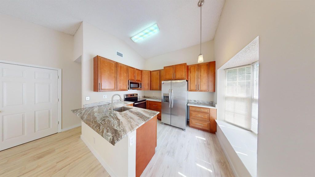 Photo of 86 Pheasant Run Boulevard, West Palm Beach, FL 33415 (MLS # R11033057)