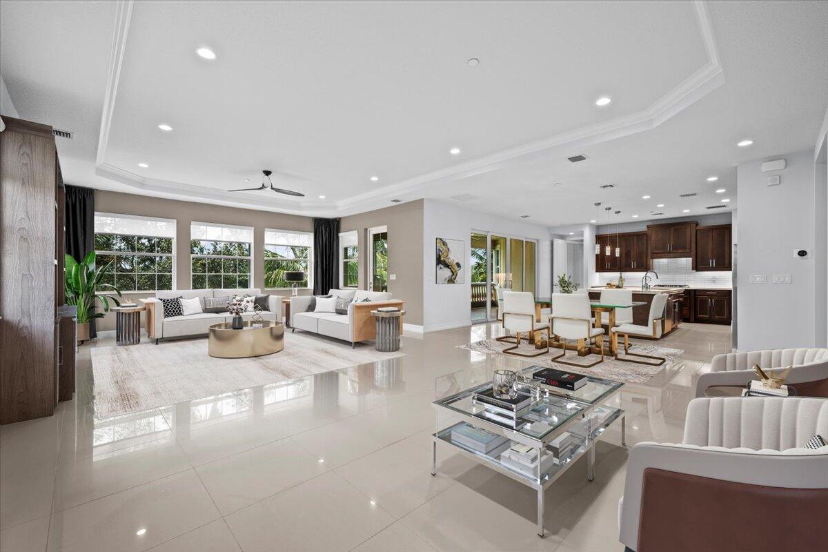 Stunning, Like New with Over 3000 Sq. Ft. of Living Space on One Level. 3Bed/2.5Bath with Private Elevator or Enlarged Staircase for Easy Entry to this Grand Single Level Loft-Like Floor Plan. Open Great Room has Separate Living & Dining Areas with an Oversized Tray Ceiling + a Large Screened-In Balcony with Beautiful Golf Course & Preserve Views. Chefs Kitchen Includes; Quartzite Counters, Glass Tile Backsplash, Custom Cabinets & Premium Appliances. Owner's Suite has a Sitting Area, His/Hers Walk-In Custom Shelved Closets & Spa-Like Bathroom. Spacious 2nd & 3rd Bedrooms. Separate Laundry Room. Porcelain Tile Floors & High Ceilings, 2 Car Garage with EV & Generator Hook-Up, Super Extended Driveway. Jupiter Country Club has Resort-Style Amenities Minutes to the Beach, Downtown & Airport.