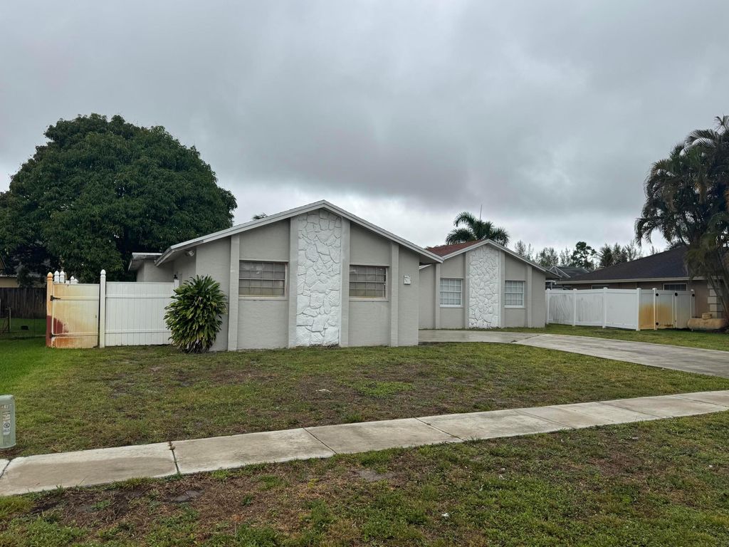 Photo of 589 Cashiers Drive, West Palm Beach, FL 33413 (MLS # B26026131)