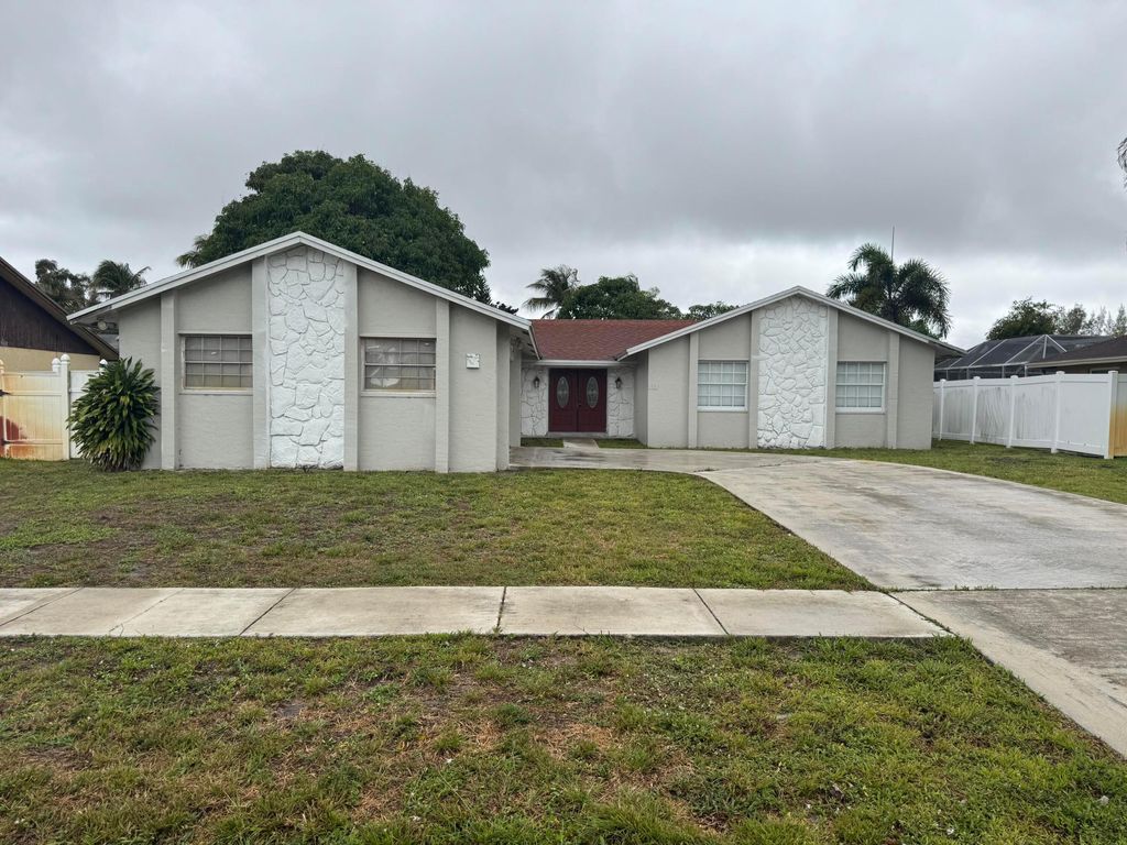 Photo of 589 Cashiers Drive, West Palm Beach, FL 33413 (MLS # B26026131)