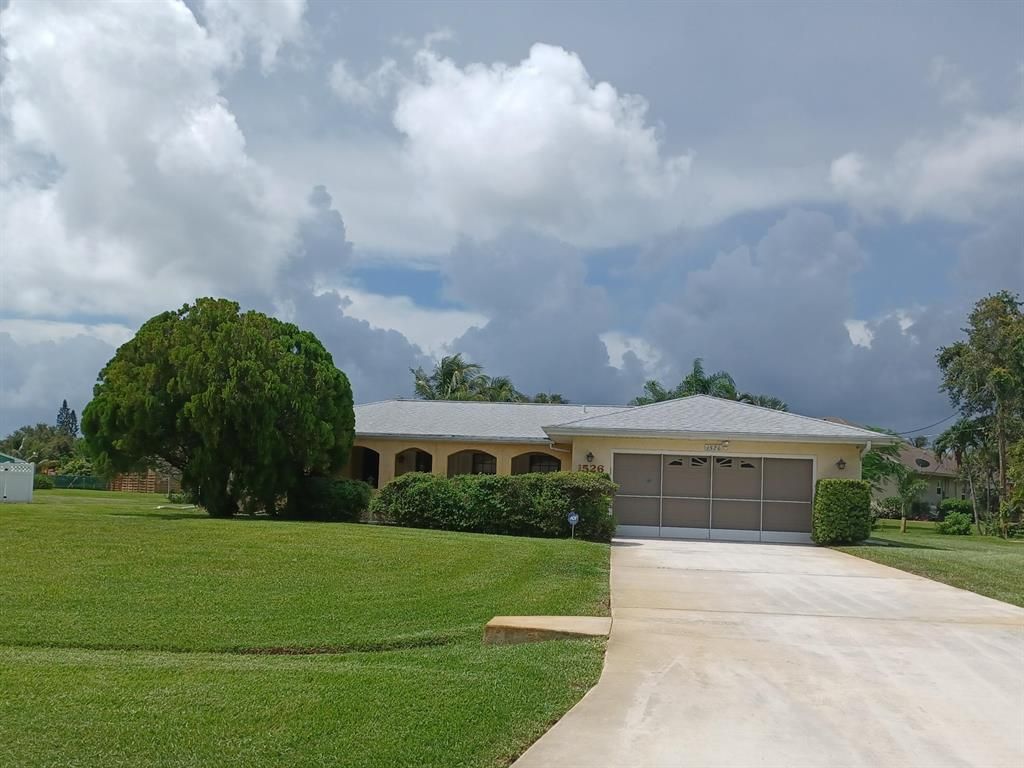 Photo of 1526 SE Chiffon Avenue, Port Saint Lucie, FL 34952 (MLS # R10730477)