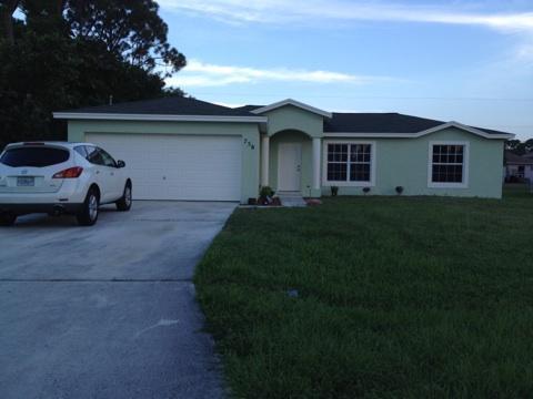 Photo of 758 SW Duxbury Avenue, Port St Lucie, FL 34983 (MLS # R10922849)