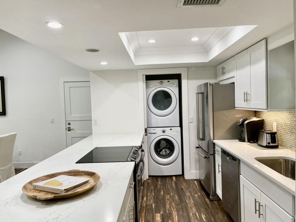 Photo of 11863 Wimbledon Circle #546, Wellington, FL 33414 (MLS # B26012104)