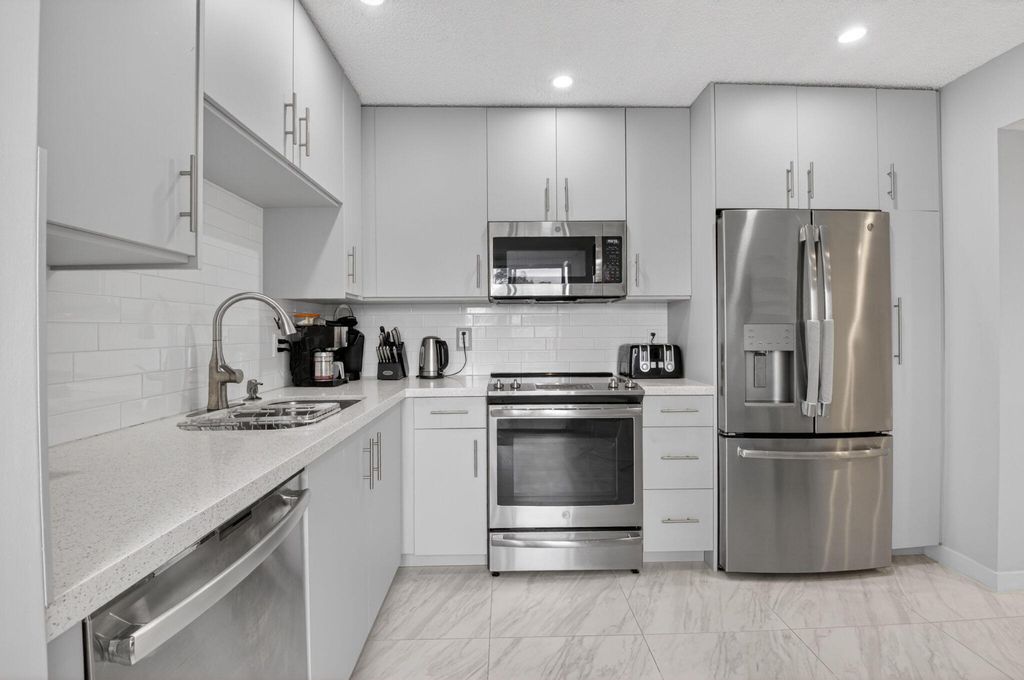 Photo of 7563 Glendevon Lane #1306, Delray Beach, FL 33446 (MLS # B26015405)
