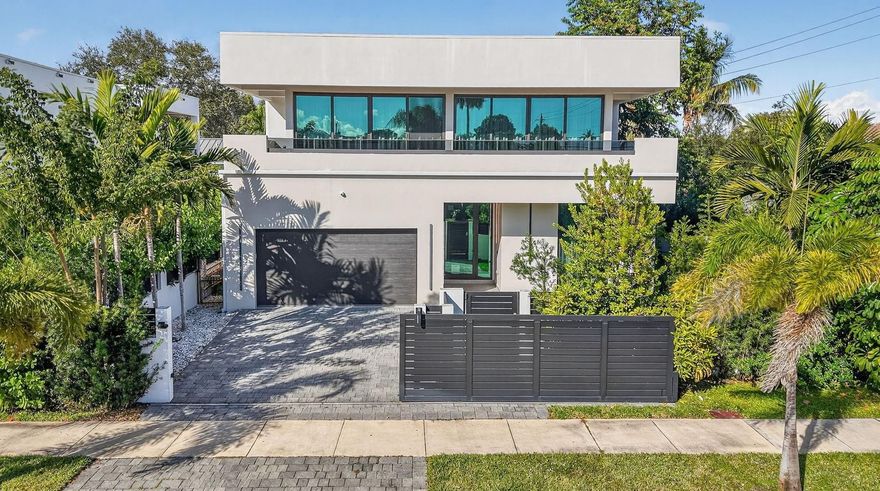 A refined Contemporary Florida Modern residence in the heart of Victoria Park. Defined by clean architectural lines, expansive impact glazing, and seamless indoor–outdoor living, this finished 2023 luxury home offers a calm, sophisticated lifestyle. Floor-to-ceiling glass fills the open living spaces with natural light, complemented by a designer kitchen featuring some top-of-the-line Gaggenau appliances, custom cabinetry, and an oversized quartz island. Outdoors, enjoy a resort-style linear lap pool, covered lanai, and modern shade pavilion in a private setting. Three En-suite bedrooms and a amazing private "Primary" bedroom retreat. Located just minutes from the Flagler Village, Las Olas Boulevard, downtown Fort Lauderdale, the Atlantic Ocean, Fine Dining and the international airport.