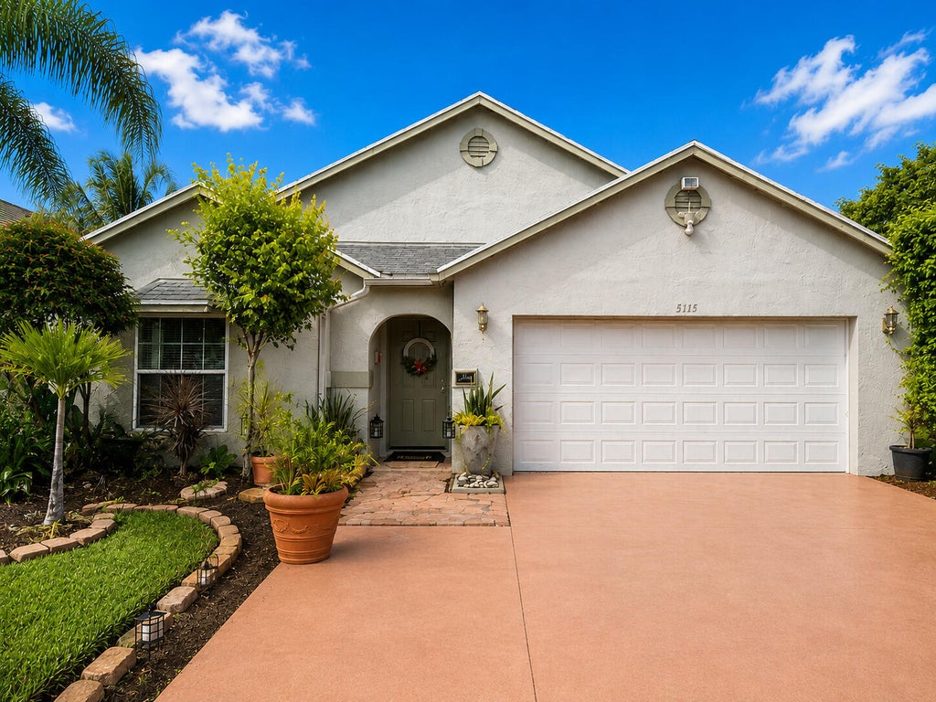 Photo of 5115 Foxhall Drive S, West Palm Beach, FL 33417 (MLS # B26070593)