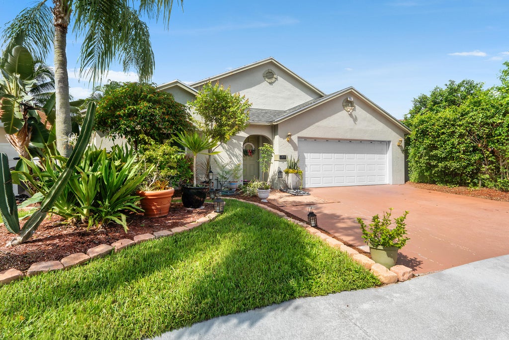 Photo of 5115 Foxhall Drive S, West Palm Beach, FL 33417 (MLS # B26070593)