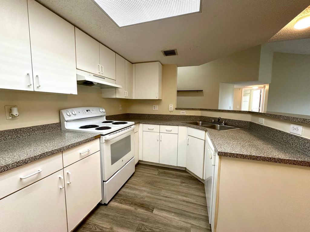 Photo of 8965 Okeechobee Boulevard #302, West Palm Beach, FL 33411 (MLS # R11122622)