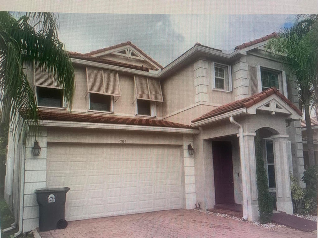 Photo of 301 MULBERRY GROVE Road, West Palm Beach, FL 33411 (MLS # B26086180)