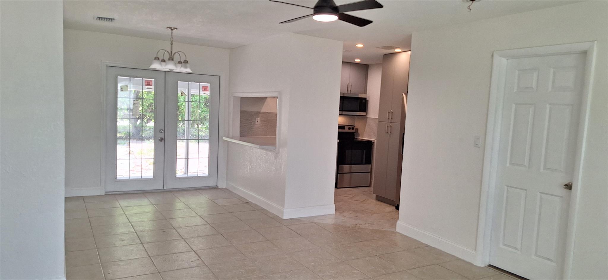 Step into this newly updated 3-bedroom, 2-bathroom home with tile flooring throughout the main living areas and warm laminate floors in the bedrooms. The fully renovated kitchen is equipped with brand-new appliances and generous counter and cabinet space. Updated guest bathroom contains all new fixtures. Contains a large back yard. Conveniently located just minutes from both I-95 and the Turnpike, this home provides easy access to major highways. This home is move-in ready!
